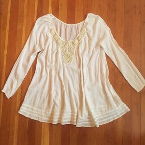 Free people boho blouse with bib detail.